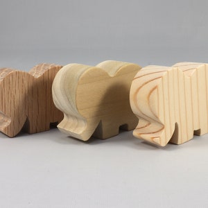 Handmade wooden toy Elephant cutout from the Itty Bitty Animal Collection stackable and unfinished crafted with traditional tools in the USA. Ideal for kid's crafts or pretend play, ready to be personalized to inspire creativity and imagination.