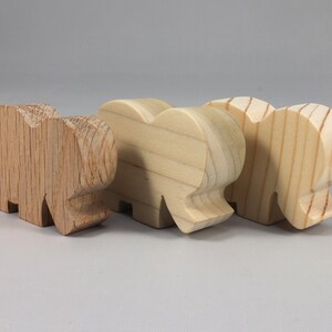 Handmade wooden toy Elephant cutout from the Itty Bitty Animal Collection stackable and unfinished crafted with traditional tools in the USA. Ideal for kid's crafts or pretend play, ready to be personalized to inspire creativity and imagination.