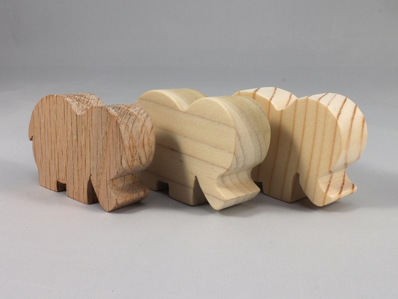 Handmade wooden toy Elephant cutout from the Itty Bitty Animal Collection stackable and unfinished crafted with traditional tools in the USA. Ideal for kid's crafts or pretend play, ready to be personalized to inspire creativity and imagination.