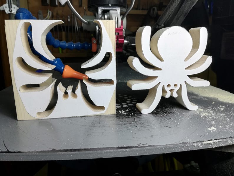 Handmade unfinished wooden Halloween spider cutout from Odin's Toy Factory Snazzy Spooks Collection. Solid wood hand-cut spider, paintable, freestanding design. Approximate size 3.5 inches height by 3.5 inches width by 0.75 inches thick. Made in Tallahassee, Florida, USA.