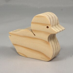 Handcrafted 2 inchwooden toy duck cutout made from 3/4-inch thick wood.