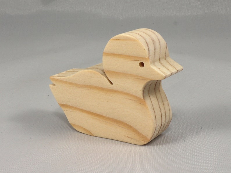 Handcrafted 2 inchwooden toy duck cutout made from 3/4-inch thick wood.