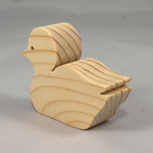 Handcrafted 2 inchwooden toy duck cutout made from 3/4-inch thick wood.