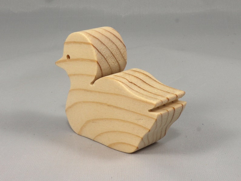 Handcrafted 2 inchwooden toy duck cutout made from 3/4-inch thick wood.
