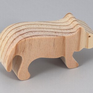 This is an unfinished wooden lioness cutout from solid wood using traditional woodworking techniques. Sanded smooth and ready to paint, stain, or customize. Freestanding design for small hands, toddlers, young children, crafters, collectors, and display. I take custom orders for any animal, quantity, and mix — including large ornament orders. Mix and match, request a different size, or send a drawing or pattern. Handmade by Odin's Toy Factory in Tallahassee, Florida, USA.