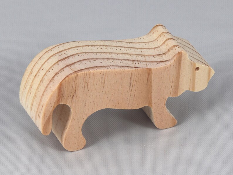 This is an unfinished wooden lioness cutout from solid wood using traditional woodworking techniques. Sanded smooth and ready to paint, stain, or customize. Freestanding design for small hands, toddlers, young children, crafters, collectors, and display. I take custom orders for any animal, quantity, and mix — including large ornament orders. Mix and match, request a different size, or send a drawing or pattern. Handmade by Odin's Toy Factory in Tallahassee, Florida, USA.