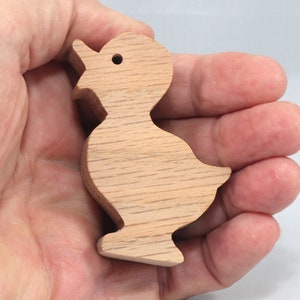 Wooden duck cutout, handmade, unfinished, and unpainted, from the Itty Bitty Animal Collection. Natural wood, freestanding, stackable, and paintable. Suitable for crafts or toys, American-made