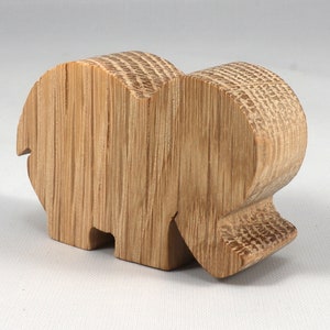 Handmade wooden toy Elephant cutout from the Itty Bitty Animal Collection stackable and unfinished crafted with traditional tools in the USA. Ideal for kid's crafts or pretend play, ready to be personalized to inspire creativity and imagination.