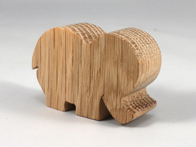 Handmade wooden toy Elephant cutout from the Itty Bitty Animal Collection stackable and unfinished crafted with traditional tools in the USA. Ideal for kid's crafts or pretend play, ready to be personalized to inspire creativity and imagination.