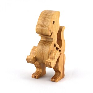 Wooden baby dinosaur figurine from My Buddies Dinos collection. Handmade with select grade hardwoods and finished with mineral oil and beeswax.