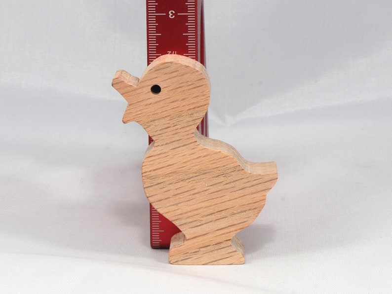 Wooden duck cutout, handmade, unfinished, and unpainted, from the Itty Bitty Animal Collection. Natural wood, freestanding, stackable, and paintable. Suitable for crafts or toys, American-made