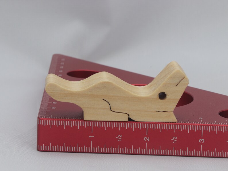 Handmade Wood Alligator Family Stacking Puzzle Mom and five baby (hatchling) alligators. This freestanding puzzle is hand-finished with a custom blend of mineral oil and waxes for a beautiful, smooth, and durable finish.