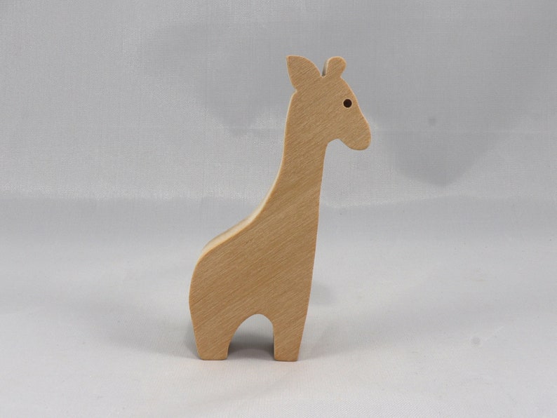 Handmade wooden giraffe cutout, unfinished, ready to paint, and freestanding. Perfect for a young child's imaginative play, stacking, or crafting.