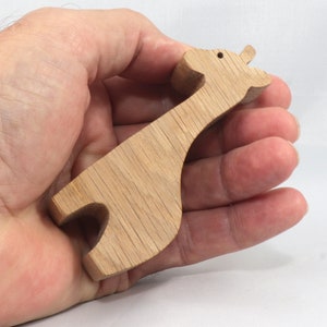 Handmade wooden giraffe cutout, unfinished, ready to paint, and freestanding. Perfect for a young child's imaginative play, stacking, or crafting.
