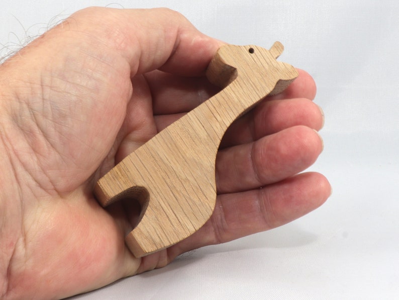 Handmade wooden giraffe cutout, unfinished, ready to paint, and freestanding. Perfect for a young child's imaginative play, stacking, or crafting.