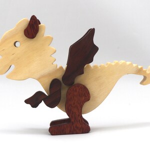 Handmade mythical fantasy dragon figurine crafted from select hardwoods and finished with custom mineral oil and wax blend from my Buddies Dragons Collection.