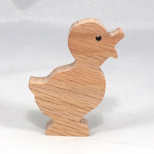 Wooden duck cutout, handmade, unfinished, and unpainted, from the Itty Bitty Animal Collection. Natural wood, freestanding, stackable, and paintable. Suitable for crafts or toys, American-made