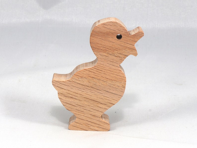 Wooden duck cutout, handmade, unfinished, and unpainted, from the Itty Bitty Animal Collection. Natural wood, freestanding, stackable, and paintable. Suitable for crafts or toys, American-made