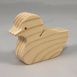 Handcrafted 2 inchwooden toy duck cutout made from 3/4-inch thick wood.
