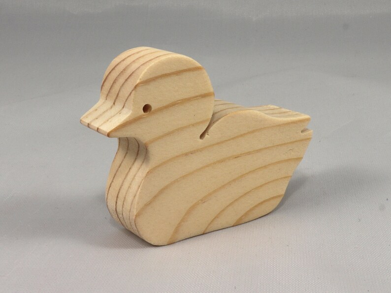 Handcrafted 2 inchwooden toy duck cutout made from 3/4-inch thick wood.