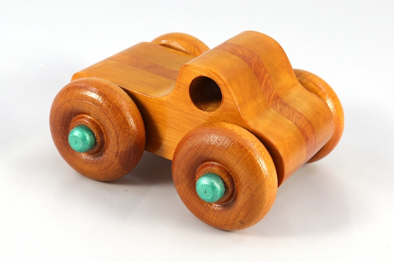 Wood Toy Monster Pickup Truck handmade in the USA from select hardwood finished with amber shellac with metallic emerald green trim. From my Play Pal Collection.
