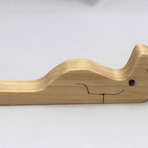 Handmade Wood Alligator Family Stacking Puzzle Mom and five baby (hatchling) alligators. This freestanding puzzle is hand-finished with a custom blend of mineral oil and waxes for a beautiful, smooth, and durable finish.