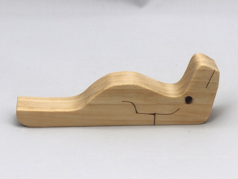 Handmade Wood Alligator Family Stacking Puzzle Mom and five baby (hatchling) alligators. This freestanding puzzle is hand-finished with a custom blend of mineral oil and waxes for a beautiful, smooth, and durable finish.