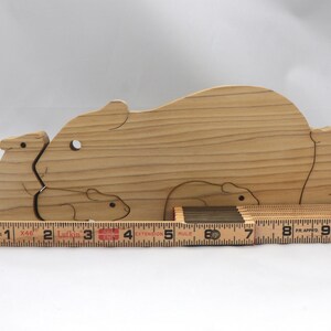 Handmade Wooden Stacking Puzzle Guinea Pig Family, Mom, and Babies finished with a non-toxic custom blend of mineral oil and waxes. This wooden toy animal is perfect for imaginative play and an excellent gift for children.