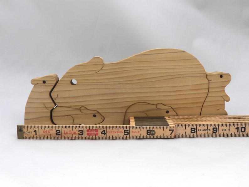 Handmade Wooden Stacking Puzzle Guinea Pig Family, Mom, and Babies finished with a non-toxic custom blend of mineral oil and waxes. This wooden toy animal is perfect for imaginative play and an excellent gift for children.