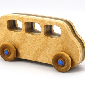 Handmade wood toy minivan made by me in my shop using traditional woodworking tools. It is hand finished with clear shellac with metallic sapphire blue acrylic paint.