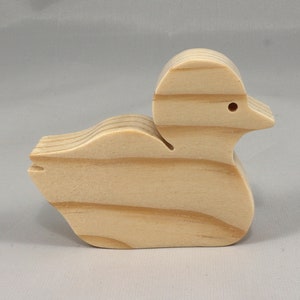 Handcrafted 2 inchwooden toy duck cutout made from 3/4-inch thick wood.
