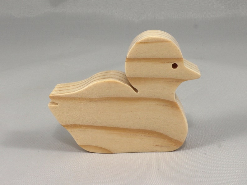 Handcrafted 2 inchwooden toy duck cutout made from 3/4-inch thick wood.