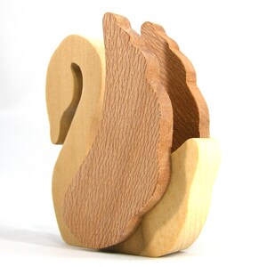 Handmade wooden swan figurine crafted from contrasting reclaimed hardwoods, sanded and ready to finish, and made in the USA.