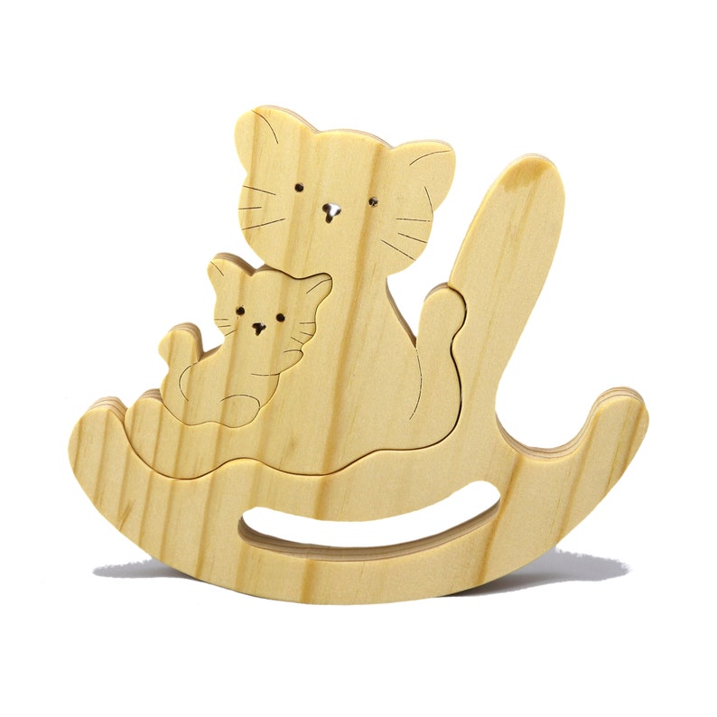 Handmade Wood Puzzle featuring Moma Cat and Baby Kitten in a Rocker, a simple three-part design crafted with traditional woodworking tools. Smoothly sanded and finished with a blend of mineral oil and beeswax for a lustrous touch.
