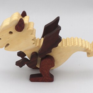 Handmade mythical fantasy dragon figurine crafted from select hardwoods and finished with custom mineral oil and wax blend from my Buddies Dragons Collection.