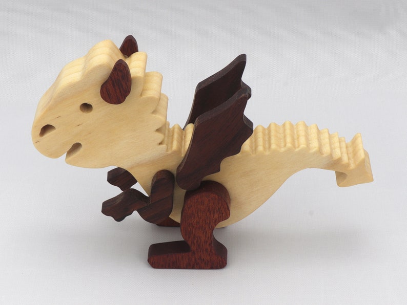 Handmade mythical fantasy dragon figurine crafted from select hardwoods and finished with custom mineral oil and wax blend from my Buddies Dragons Collection.