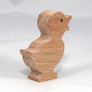 Wooden duck cutout, handmade, unfinished, and unpainted, from the Itty Bitty Animal Collection. Natural wood, freestanding, stackable, and paintable. Suitable for crafts or toys, American-made
