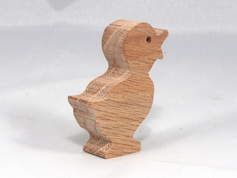 Wooden duck cutout, handmade, unfinished, and unpainted, from the Itty Bitty Animal Collection. Natural wood, freestanding, stackable, and paintable. Suitable for crafts or toys, American-made