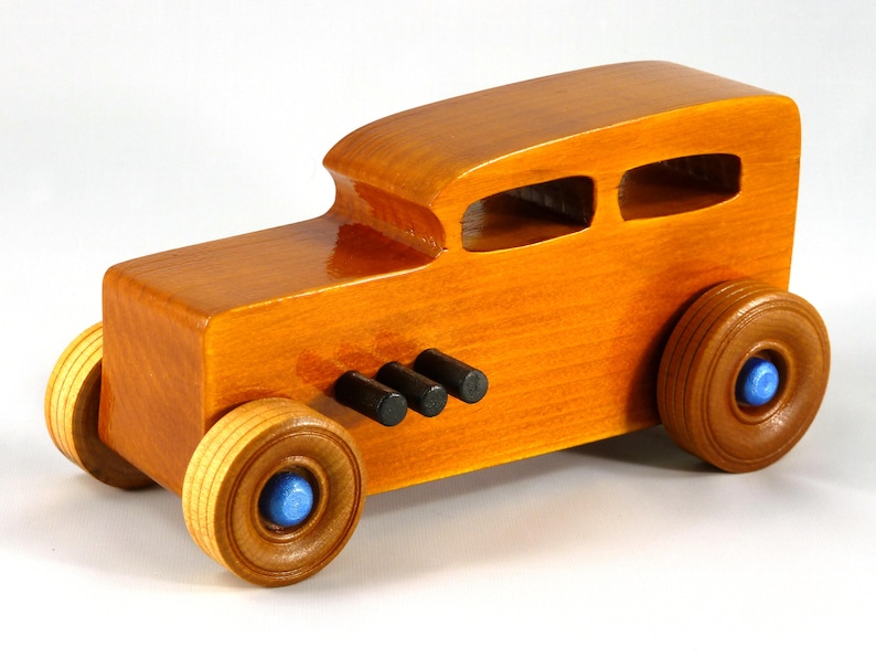 Handmade Wood Toy Car Hot Rod 1932 Sedan Finished With Amber Shellac And Trimmed With Metallic Saphire Blue And Black Acrylic Paint From My Hot Rod Collection