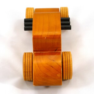 Handmade Wood Toy Car Hot Rod Based On The 1927 T-Coupe. It Has Been Hand-Finished With Multiple Coats Of Amber Shellac And Trimmed With Black Acrylic Paint.