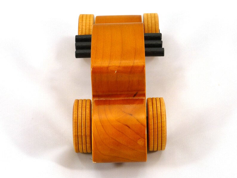 Handmade Wood Toy Car Hot Rod Based On The 1927 T-Coupe. It Has Been Hand-Finished With Multiple Coats Of Amber Shellac And Trimmed With Black Acrylic Paint.