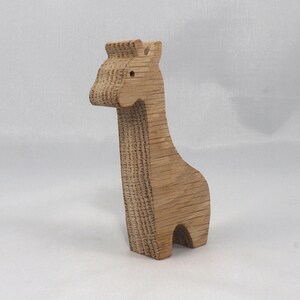 Handmade wooden giraffe cutout, unfinished, ready to paint, and freestanding. Perfect for a young child's imaginative play, stacking, or crafting.