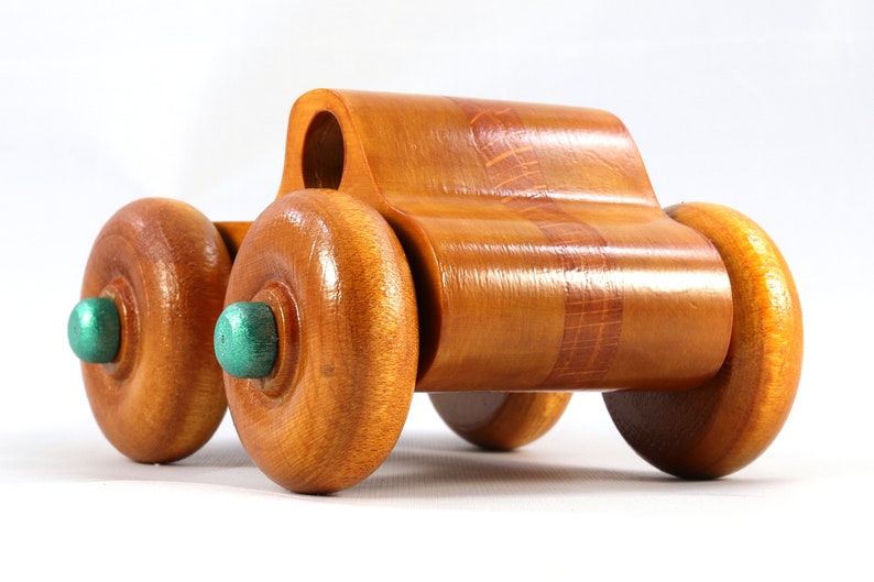 Wood Toy Monster Pickup Truck handmade in the USA from select hardwood finished with amber shellac with metallic emerald green trim. From my Play Pal Collection.
