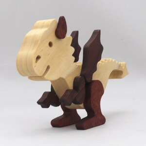 Handmade mythical fantasy dragon figurine crafted from select hardwoods and finished with custom mineral oil and wax blend from my Buddies Dragons Collection.