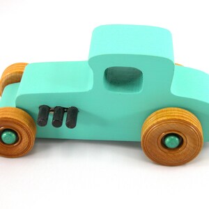Handmade Wood Toy Car Hot Rod 1927 T-Coupe Painted with Turquoise,  Metallic Emerald Green, And Black Acrylic Paint With Wheels Finished With Nonmaring Amber Shellac Wheels