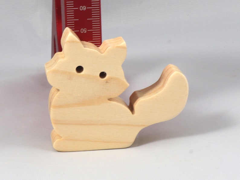 Handmade and unfinished, this stackable toy kitten cat cutout is ready to paint. This unpainted cutout is an excellent option for a fun DIY project or as a pretend toy for children. Available in several sizes, including custom orders.