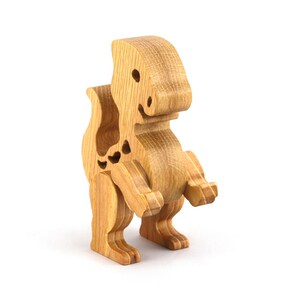 Wooden baby dinosaur figurine from My Buddies Dinos collection. Handmade with select grade hardwoods and finished with mineral oil and beeswax.