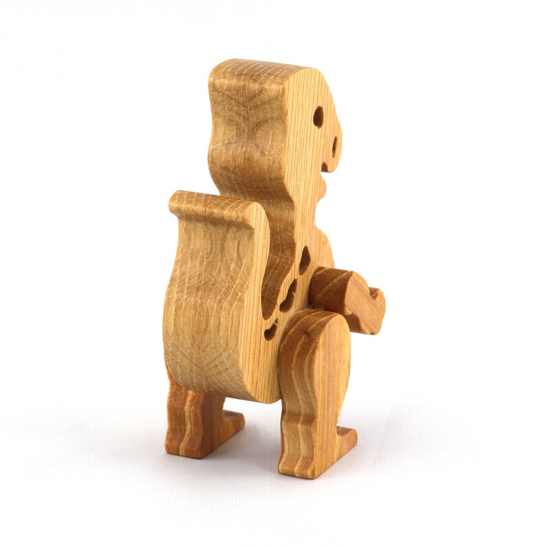 Wooden baby dinosaur figurine from My Buddies Dinos collection. Handmade with select grade hardwoods and finished with mineral oil and beeswax.
