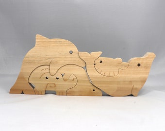 Wooden Sea Life Family Puzzle Animals Include a Dolphin, Crab, Seal, and Fish. Handmade From Hardwood And Hand Finished With Clear Shellac.