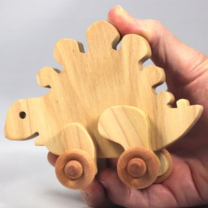 Handmade push toy stegosaurus crafted from select grade hardwoods and finished with a non-toxic coating.